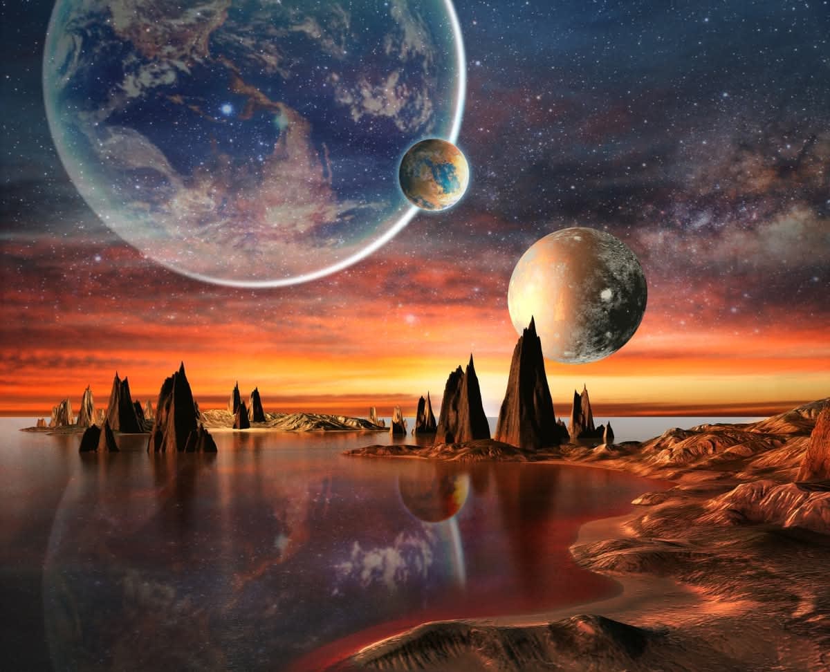 Alien planet with mountains, sea and planets on background. (Representative Image Source: Getty Images | Ralwel)