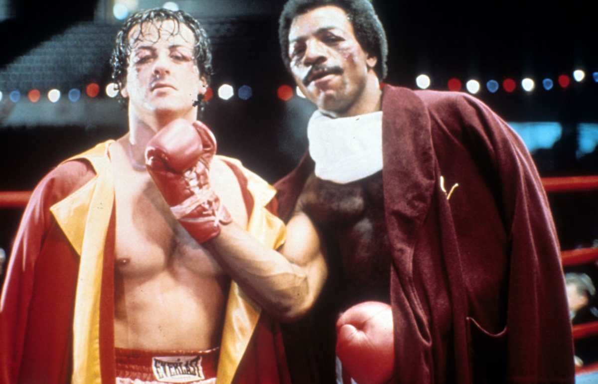 Representative Image Source: Sylvester Stallone and Carl Weathers on set of the film 'Rocky', 1976. (Photo by United Artists/Getty Images)