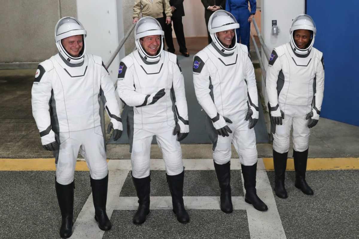 Image Source: Crew-8 astronauts (L-R) Russian cosmonaut Alexander Grebenkin, Pilot Michael Barratt, Commander Matthew Dominick, and Mission Specialist Jeanette Epps.  (Photo by Joe Raedle/Getty Images)