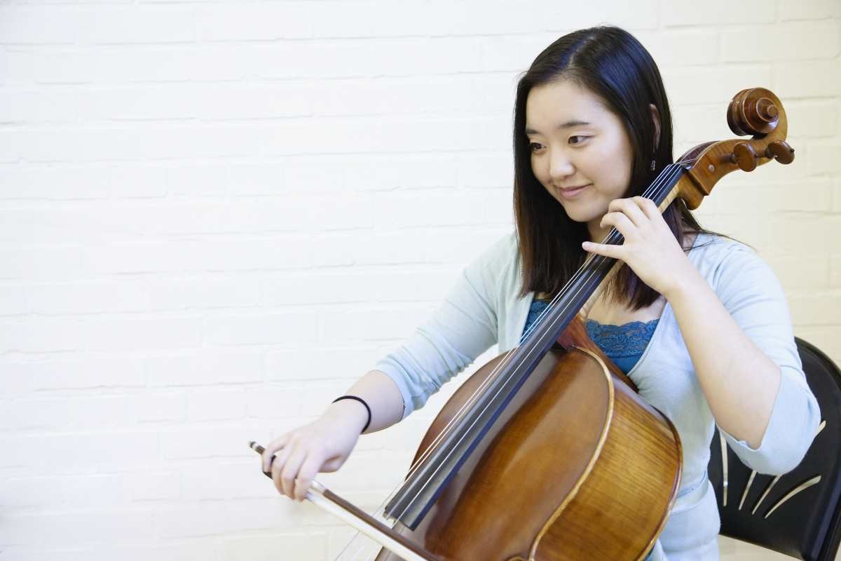 Representative Image Source: Young woman playing cello, smiling, close-up (Getty Images)