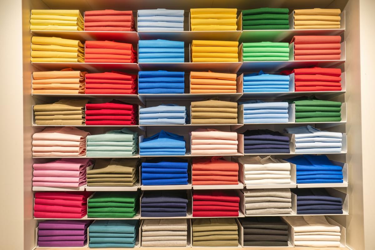 Representative Image Source: A collection of polo shirts and sweaters in all colors inside a wardrobe. (Getty Images)