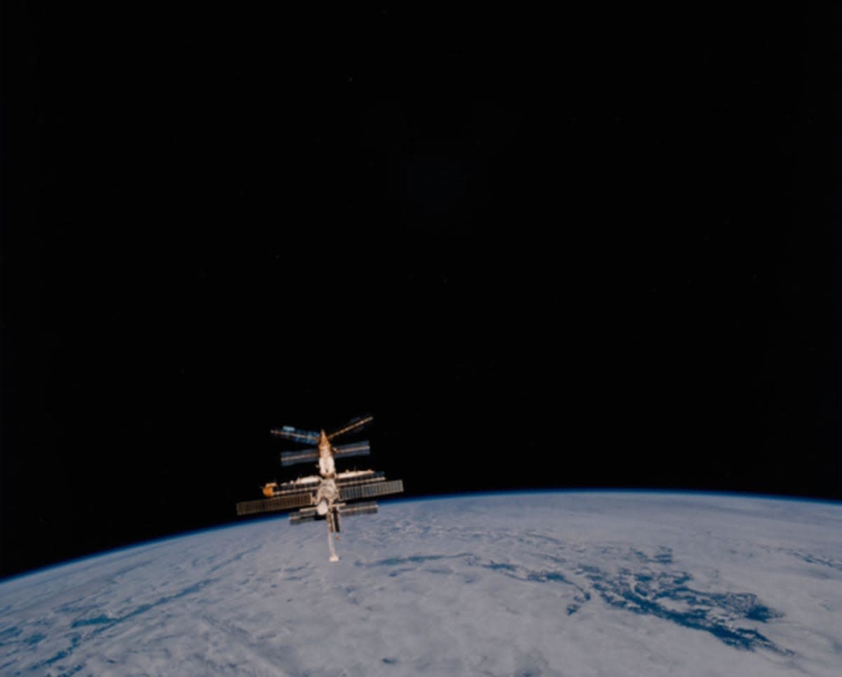 Image source: The Russian Space Station Mir backdropped against the darkness of space and the Planet Earth after Mir had separated from the Space Shuttle Atlantis in January 1997. (Photo by Space Frontiers/Archive Photos/Hulton Archive/Getty Images)