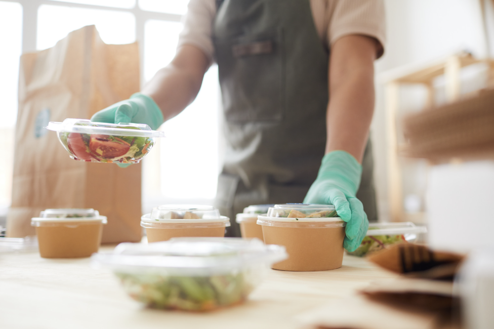 Man with packaged salads