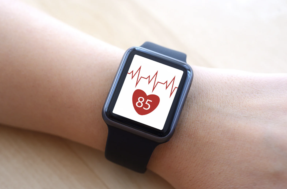 Heart monitor on wrist.