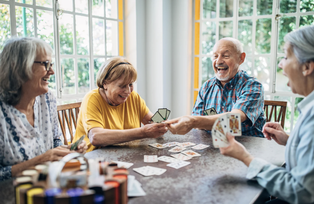 Older people playing poker.