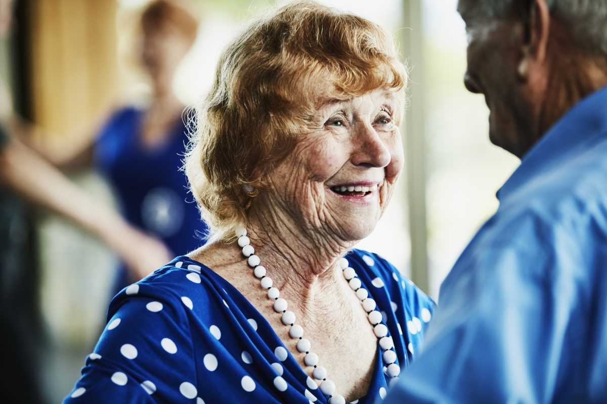 Representative Image Source: Smiling senior woman looking at husband while dancing in ballroom. (Photo by Thomas Barwick for Getty Images)