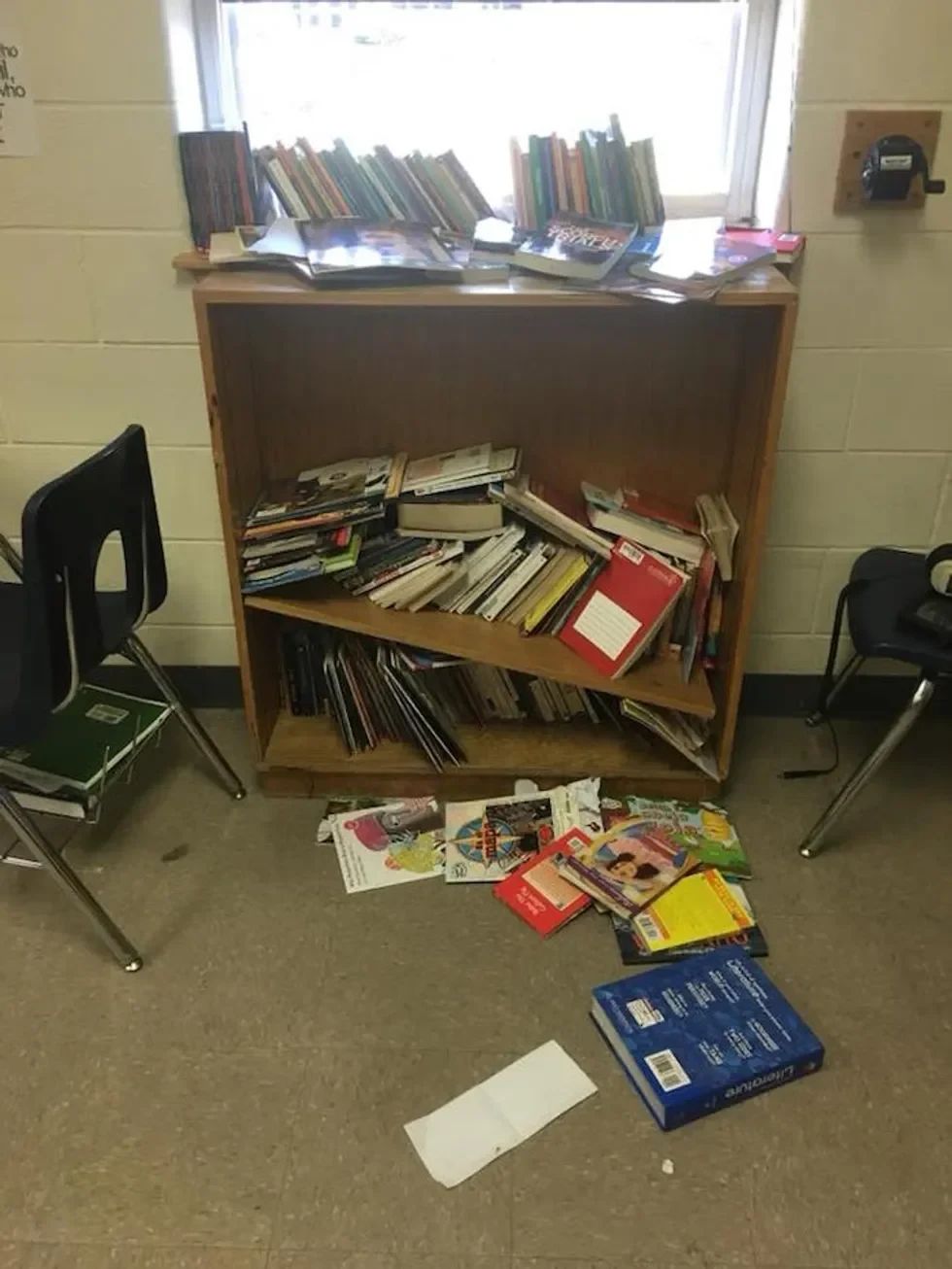 Disarrayed bookshelf.