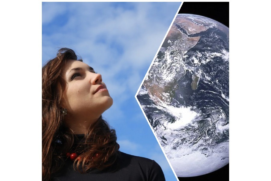 woman looking up toward the sky; earth from space