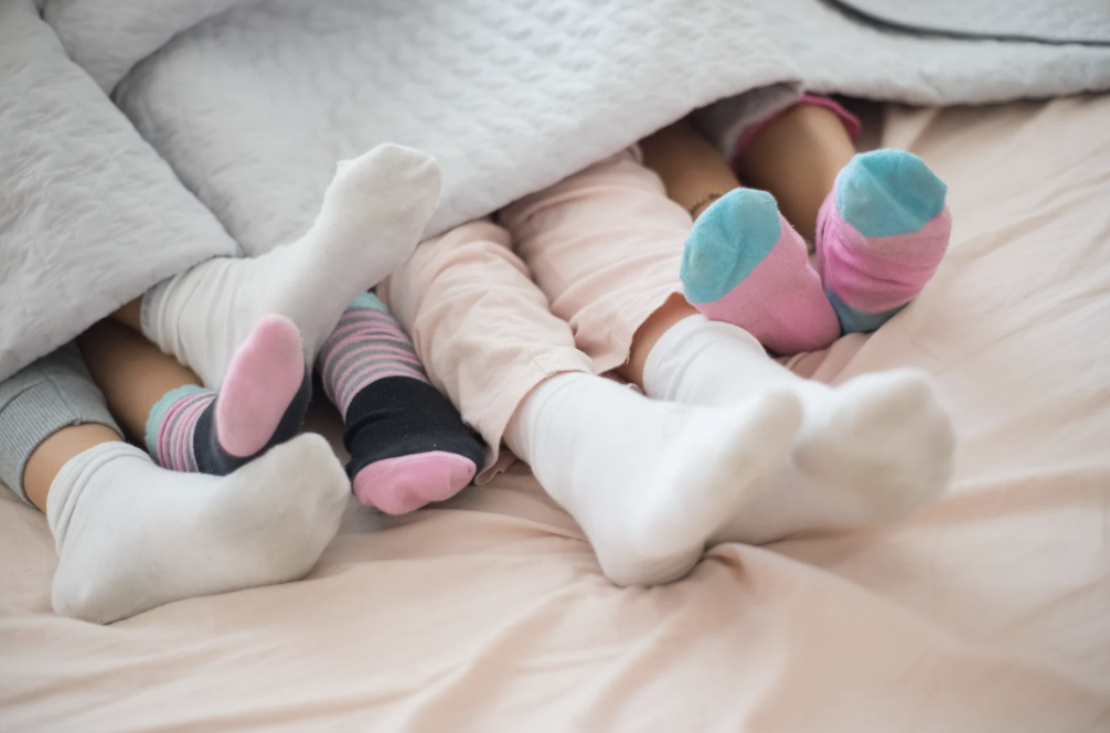 sock feet, socks, bed, sleep, better sleep, rest