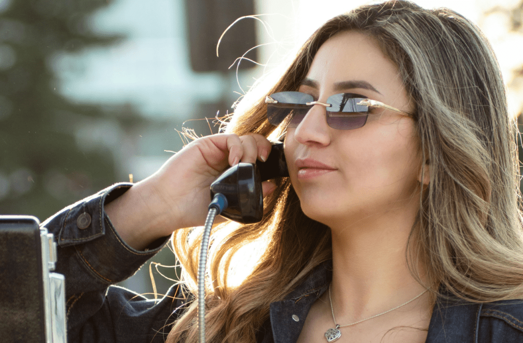 pay phone, cell phone, digital divide, rural living, communication
