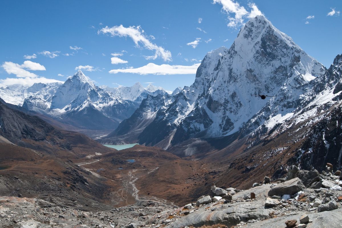 geology, plate tectonics, continental drift, mountain formation, Mount Everest, Tibetan Plateau, helium study, Stanford research, AGU 2023, delamination, seismic activity, earthquake risk, geodynamic research, Bhutan springs, Earth science, mantle rocks