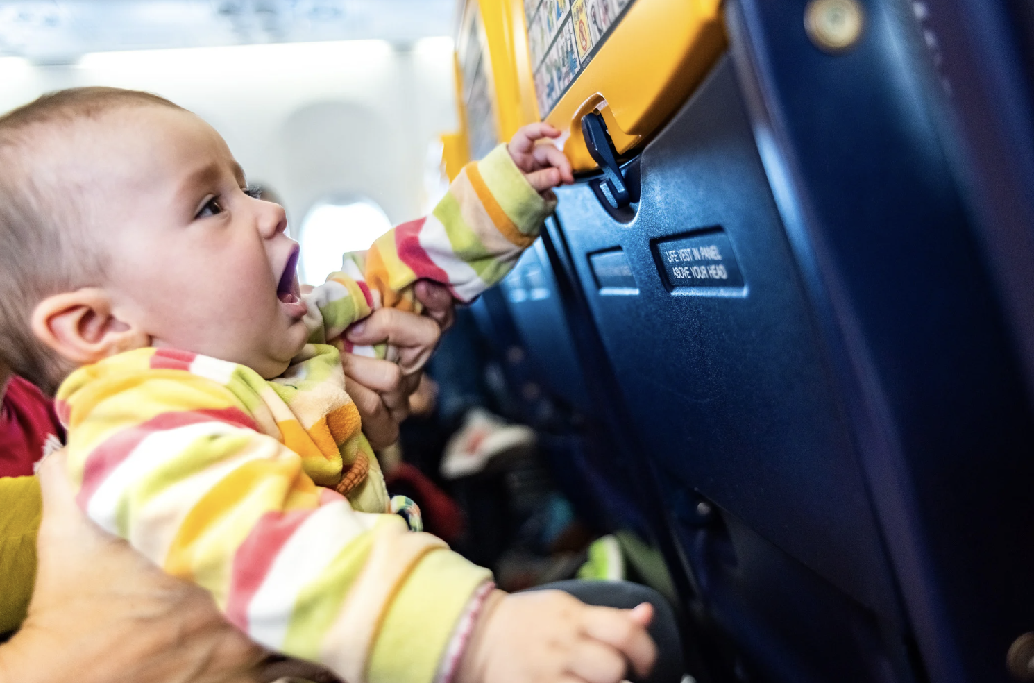 airplane etiquette, seat-swap, flying with kids, Mumsnet, travel debate, parenting, passenger rights, family travel, airline seats, viral post