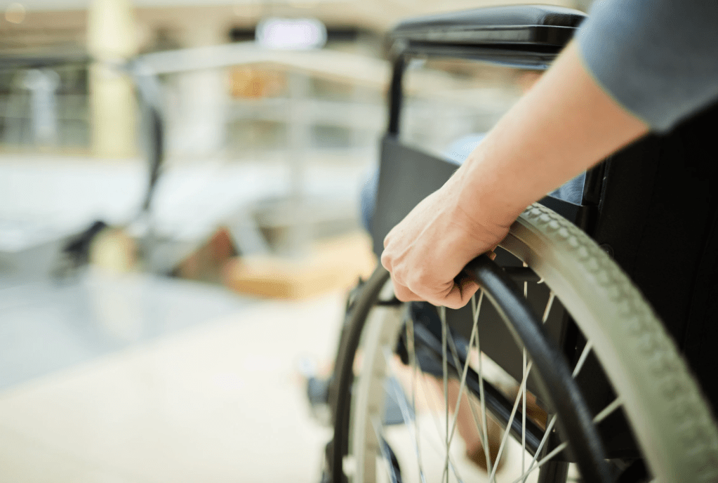 disability rights, accessibility, ableism, discrimination, viral TikTok, Madeline Delp, parking attendant, harassment, wheelchair user, public access