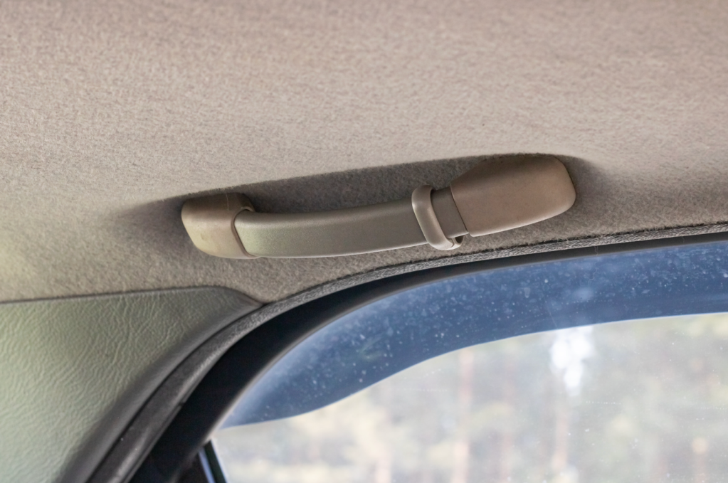 car grab handle, oh shit handle, viral tweet, driving humor, Taylor Myers, car interior features, funny driving memes, passenger anxiety