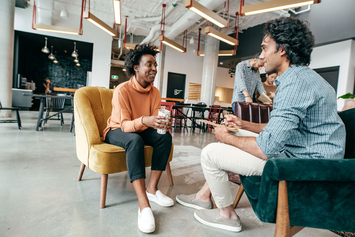 A diverse group of professionals networking at an event.