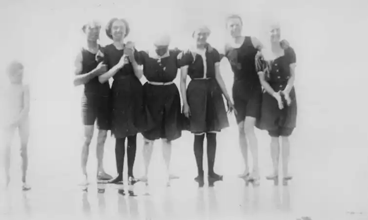 A group of friends, covered from neck to knee.