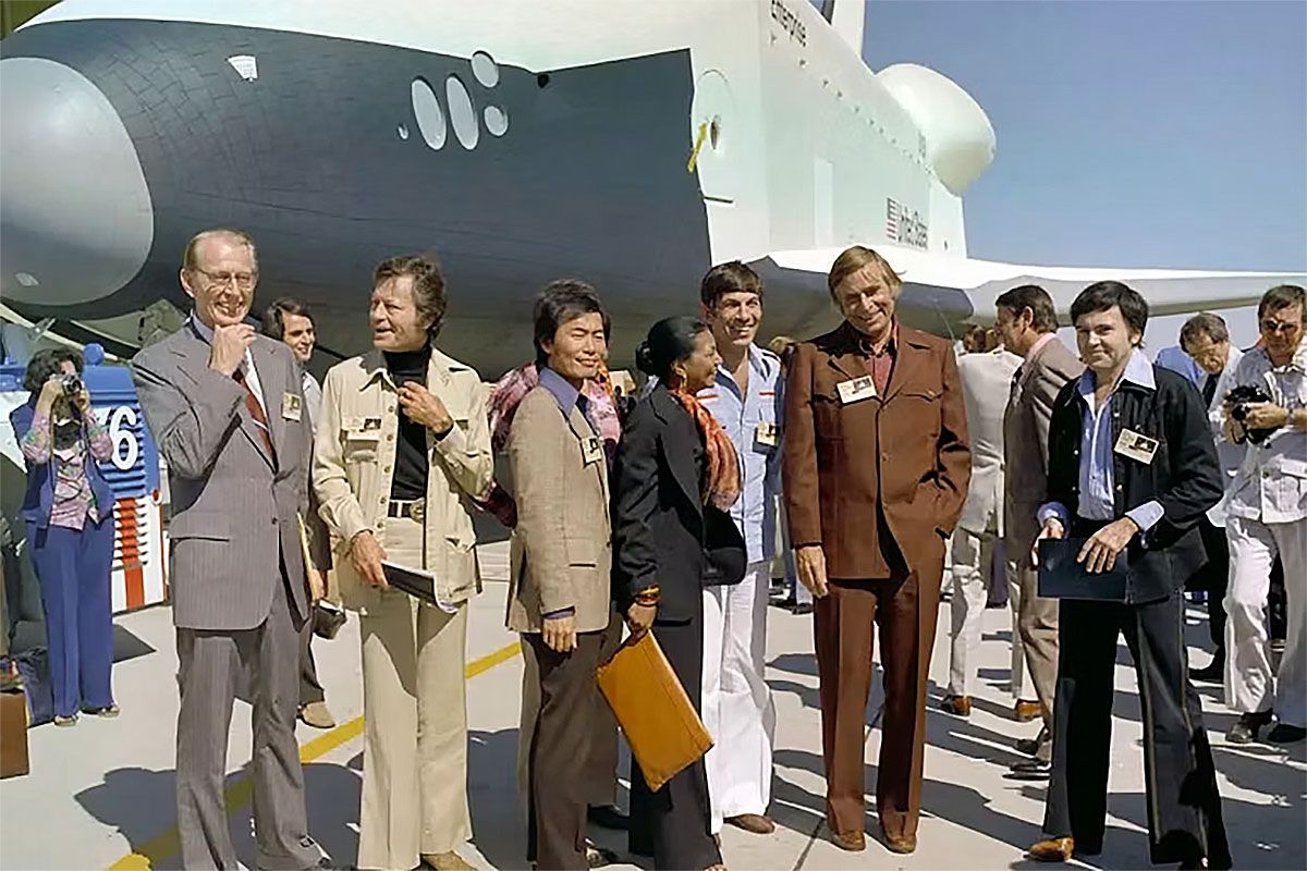 Gene Roddenberry, second from right, and Star Trek cast members visit the Space Shuttle Enterprise in 1976 with NASA Administrator James C. Fletcher, left. NASA