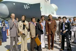 Gene Roddenberry, second from right, and Star Trek cast members visit the Space Shuttle Enterprise in 1976 with NASA Administrator James C. Fletcher, left. NASA